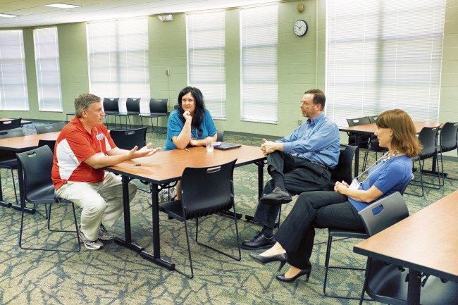 Scott Dobler (l) and Amy Murrell Taylor (r) disussing the use of GIS in Kentuky history research