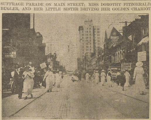 photo of suffragists marching on both sides of the street